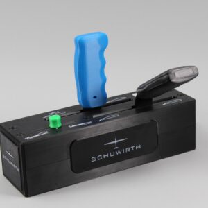 Schuwirth glider control joystick - black control panel with blue handle, black lever, and green button